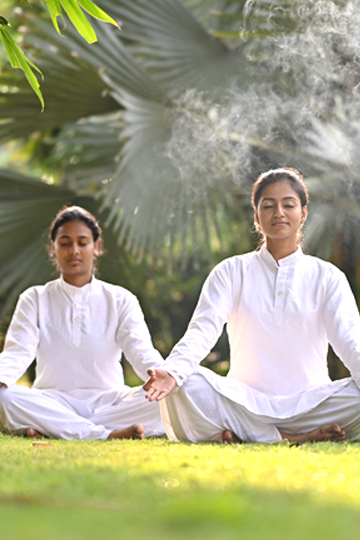 asian-indian-college-student-focus-working-laptop-reading-book-while-other-classmates-background-outdoor-picture-university-campus_466689-8079
